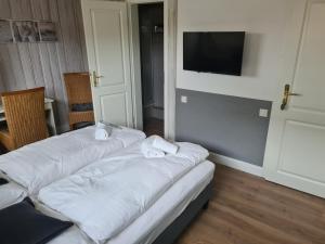 Postel nebo postele na pokoji v ubytování Budget