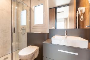 Koupelna v ubytování Chalets & Glamping Nassfeld by ALPS RESORTS