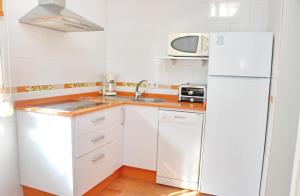 Kuchyň nebo kuchyňský kout v ubytování Apartamento Las Virtudes