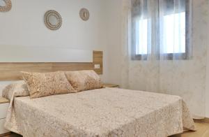 Postel nebo postele na pokoji v ubytování Casa con piscina de agua salada I + 13 fotografií
