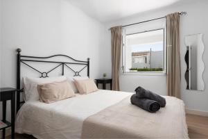 Posteľ alebo postele v izbe v ubytovaní NEW! Apartment SUNSET 1, Pool, AC, BBQ, Wifi, Cala D'or, Mallorca