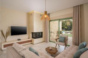 TV a/nebo společenská místnost v ubytování Kontis Village