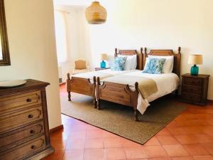 Postel nebo postele na pokoji v ubytování Quinta com piscina exclusiva e experiências únicas