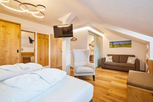 Postel nebo postele na pokoji v ubytování Hotel Rupertihof