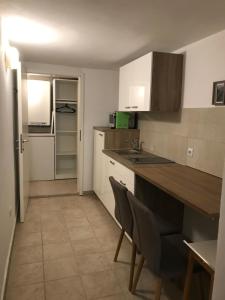 Kuchyň nebo kuchyňský kout v ubytování Seaside Guesthouse by JR City Apartments