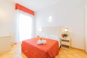 Postel nebo postele na pokoji v ubytování Residence Promenade