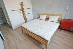 Postel nebo postele na pokoji v ubytování Apartmán Polygon