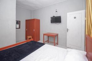 Lidez Residence Bitung客房内的一张或多张床位