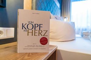 Postel nebo postele na pokoji v ubytování Berghotel & Chalets Adersberg Chiemgau Card kostenfrei