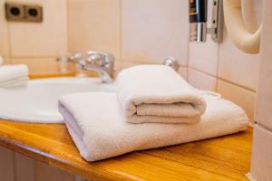 Koupelna v ubytování Berghotel & Chalets Adersberg Chiemgau Card kostenfrei