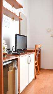 Kuchyňa alebo kuchynka v ubytovaní Hotel Adria