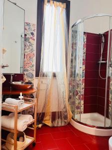 a bathroom with a shower and a sink at Sicilia Vacation in Trapani