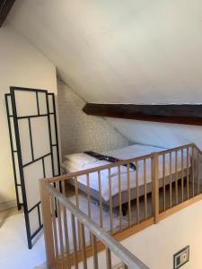 Divstāvu gulta vai divstāvu gultas numurā naktsmītnē Brussels Guest House