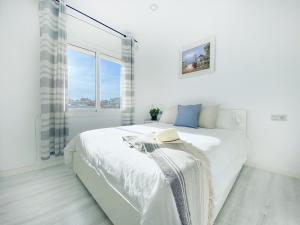 Кровать или кровати в номере fantasticas vistas a mar