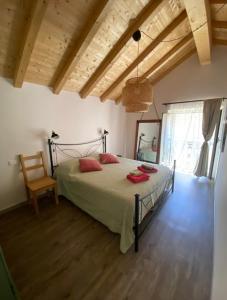 Postel nebo postele na pokoji v ubytování Casa Vacanza L'Ulivo