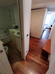 a bathroom with a sink and a toilet and a mirror at Margot in Vernazza