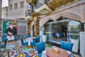 A restaurant or other place to eat at Hotel & Ryad DALILA