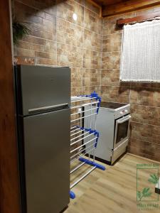 Kuchyň nebo kuchyňský kout v ubytování Planinska kuća Čudesni bor