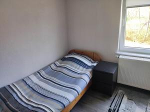 Postel nebo postele na pokoji v ubytování Monteurzimmer