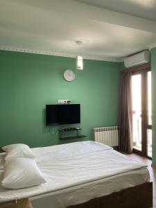 Μια τηλεόραση ή/και κέντρο ψυχαγωγίας στο Happy Stay