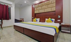 Postel nebo postele na pokoji v ubytování Itsy Hotels Hamlets Stay