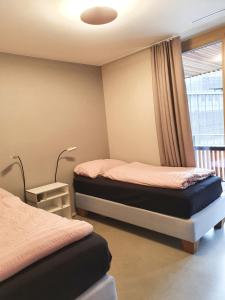 Postel nebo postele na pokoji v ubytování Ferienwohnung Stenna SELVA an Toplage