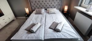 Posteľ alebo postele v izbe v ubytovaní Labo Apartment Fort Wola + 15 fotografií