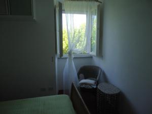 Postel nebo postele na pokoji v ubytování Voglia di mare