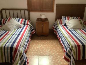 Posteľ alebo postele v izbe v ubytovaní Cortijo de la Fuente