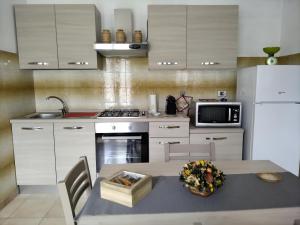Köök või kööginurk majutusasutuses Il Poietto