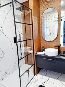 A bathroom at Apartament Węgorzewo