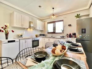 A kitchen or kitchenette at Beach Villa Verano with private pool by DadoVillas