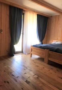 Letto o letti in una camera di Hotel Chubezeni
