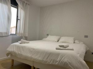 Llit o llits en una habitació de Mar y Playa de Martín, 2B