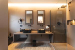 A bathroom at Hotel Castel Mani