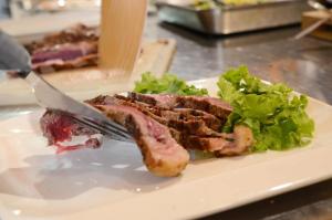 Eten bij of ergens in de buurt van het aparthotel


