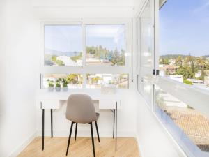 A balcony or terrace at Cubo's Estudio Esmeralda Beach