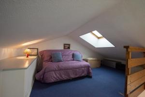 מיטה או מיטות בחדר ב-Appartement a 900m de la plage aux Sables d'Olonne