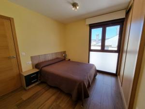 Łóżko lub łóżka w pokoju w obiekcie Foz Playa Rapadoira - 3 dormitorios