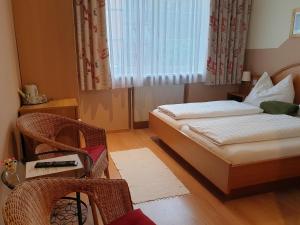Posteľ alebo postele v izbe v ubytovaní Hotel Pension Alte Mühle