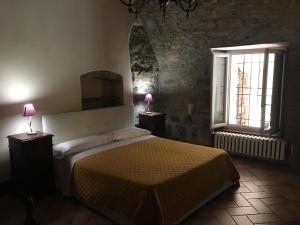 A bed or beds in a room at Casa Mario Lupo - Apartments and Rooms