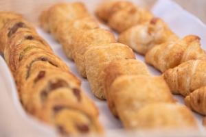 a plate of pastries sitting on a table at Hotel Vale Da Telha in Aljezur