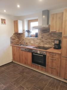 Una cocina o cocineta en Apart Alpinea