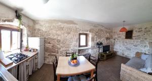 Kuchyň nebo kuchyňský kout v ubytování Apartment Maestro