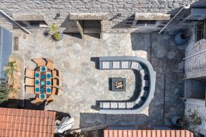 a building with a mural on the side of it at Alexandros 3 in Skouloúfia +17 photos