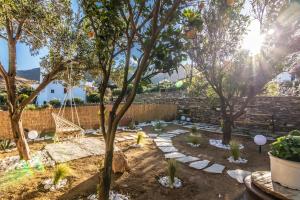 Vonkajšia záhrada v ubytovaní Livadi house Tinos 2 katwi