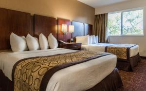 Letto o letti in una camera di Hotel Moab Downtown