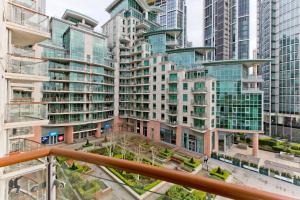 a view from a balcony of tall buildings at River views in London