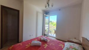 Postel nebo postele na pokoji v ubytování Apartment LANKA