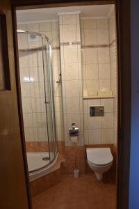 Kúpeľňa v ubytovaní Mazurskie apartamenty 2